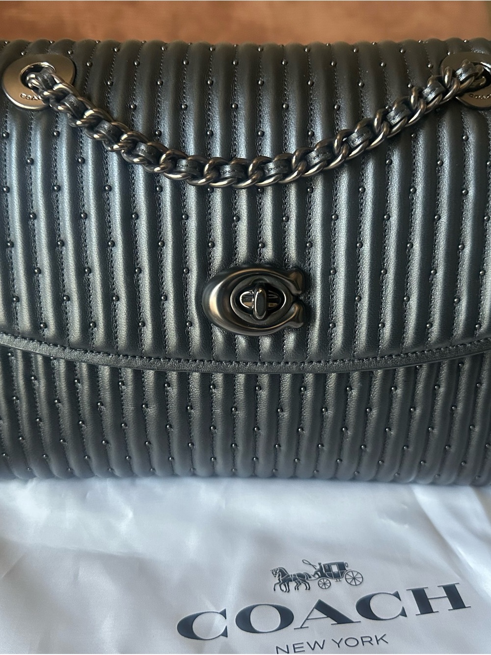 Coach Parker Quilted Leather bag with rivets in Black with Gunmetal hardware.